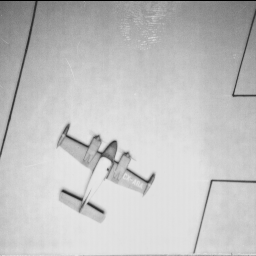 An image of a plane. Top view. An old airplane, might be a toy